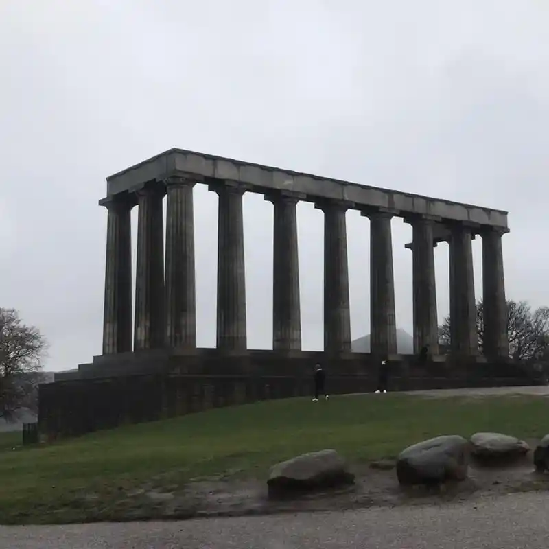 Photograph of stone columns on a hill